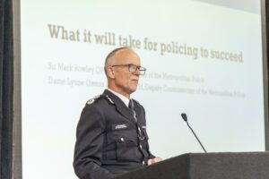 Sir Mark Rowley standing at lectern