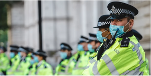 Police officers wearing masks