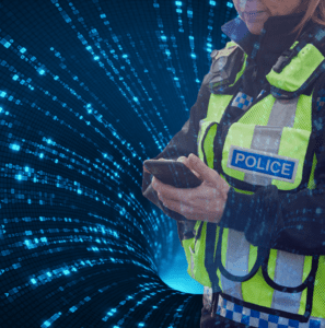 Female police officer using a mobile phone